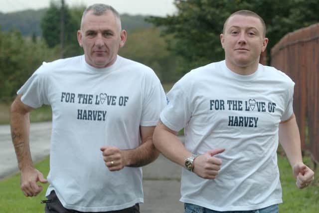 Stephen Greaves (left) in 2005, when he ran from Louth to Dinnington to raise cash for The Love of Harvey appeal on Oct 29 and 30. Sheffield United keeper Paddy Kenny (right) joined for the last five miles.