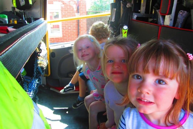 Annabelle, Darcie and Annabelle enjoyed sitting in the cab of one of Worksop Fire Station's fire engine.