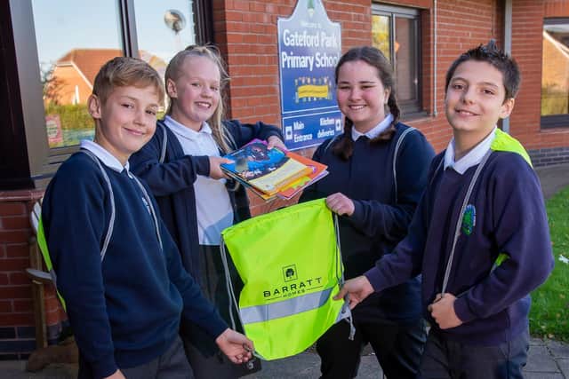 The pupils at Gateford Park Primary School stocking up their kit bags during Walk to School Month.