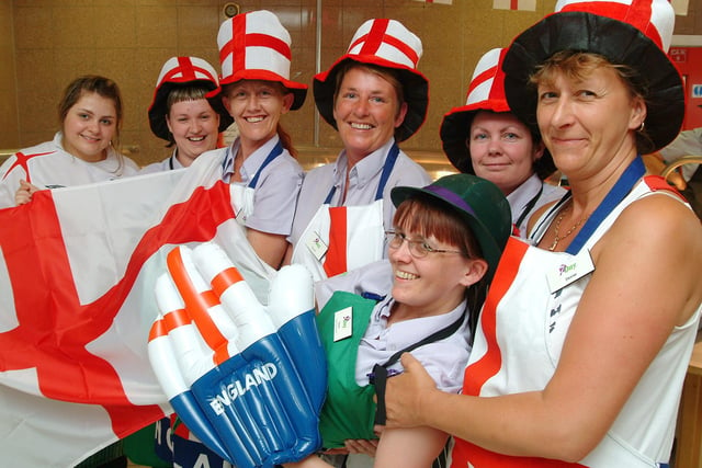 Canteen staff are celebrating the World Cup tournament in 2006 at Wilko's Distribution Centre, at Manton Wood. Picture includes organisers Cheryl Stanley, Dawn Bradbury and Tracey Dennington.