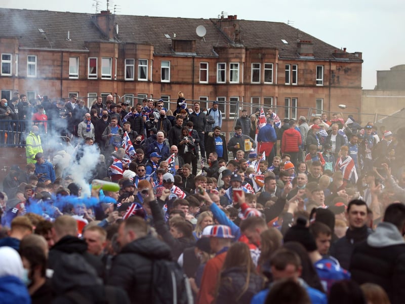 It's the first time in a decade that Rangers have taken a title with many fans determined to mark the occasion at the club's ground despite advice to stay at home and celebrate locally. Andrew Milligan/PA
