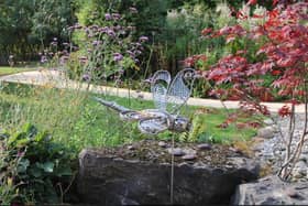 The new dragonfly sculpture by Robin Widdowson is now in place at Bluebell Wood Children's Hospice. Photo: Bluebell Wood