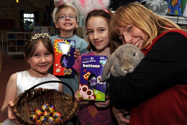 Tamara Gibbs, five, Ryan Jones, six, Bethany Smith, 10 and Anne-Louise King, manager of Lilliput Day Nursery, holding Harlyn the rabbit.
