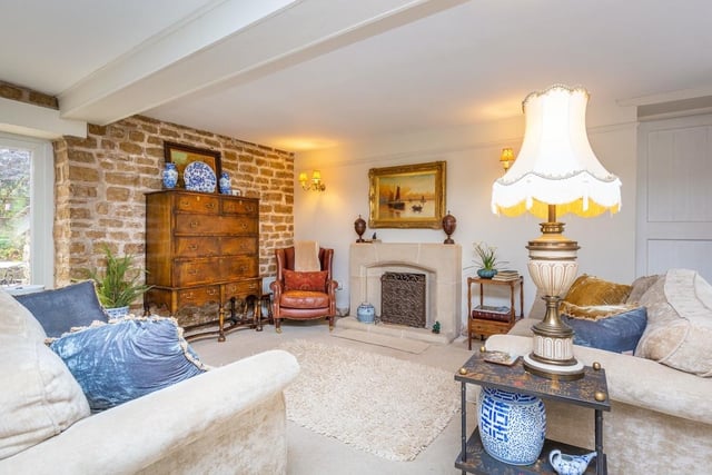At the heart of the ground floor is this spacious living room, which boasts bundles of character.