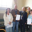 Members of the Worcestershire and Sherwood Foresters Regimental Association receive their certificates.