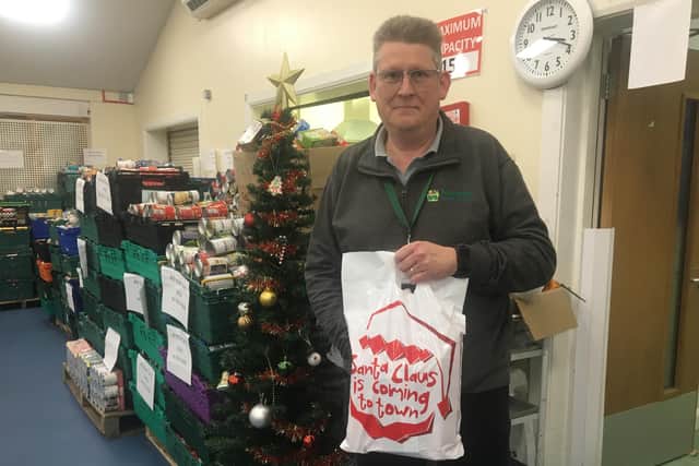 Bassetlaw Food Band Manager Robert Garland with a ready-prepared Christmas bag