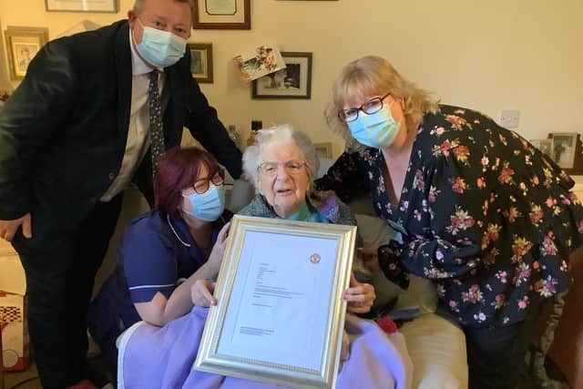 Nora celebrating her 106th birthday with her family, and the team at Gateford Hill Care Home.