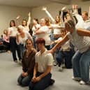 Members of Worksop Musical Theatre Society in rehearsal for   'Our Time: the music, the memories, the people!'