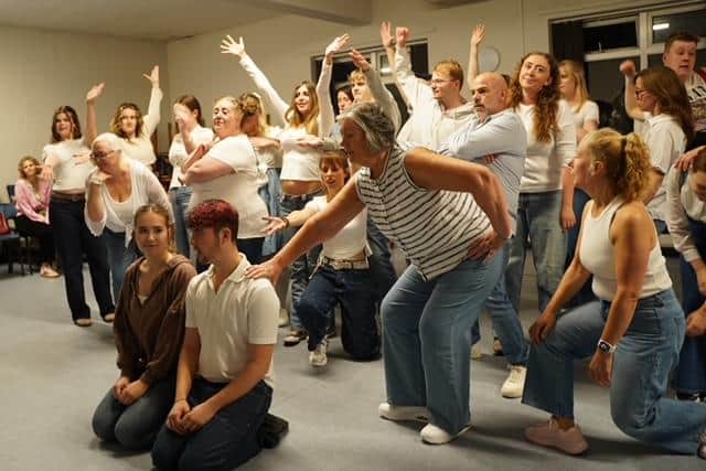 Members of Worksop Musical Theatre Society in rehearsal for 'Our Time: the music, the memories, the people!'