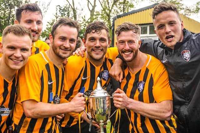 Tigers with the 2018/19 NCEL Premier Division trophy. Pic: Lewis Pickersgill.