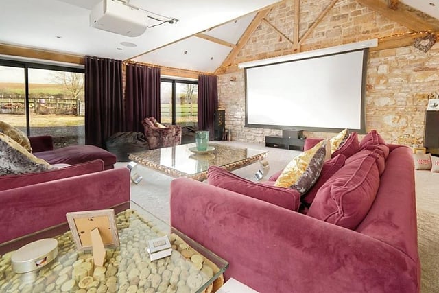 It's luxury and comfort all the way in the lounge/cinema room. Not to mention amazing views of the open countryside.