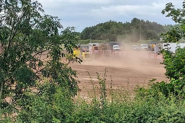 Building work at the new housing development has caused dust to travel to neighbouring homes. Photo: Hamish McDonald