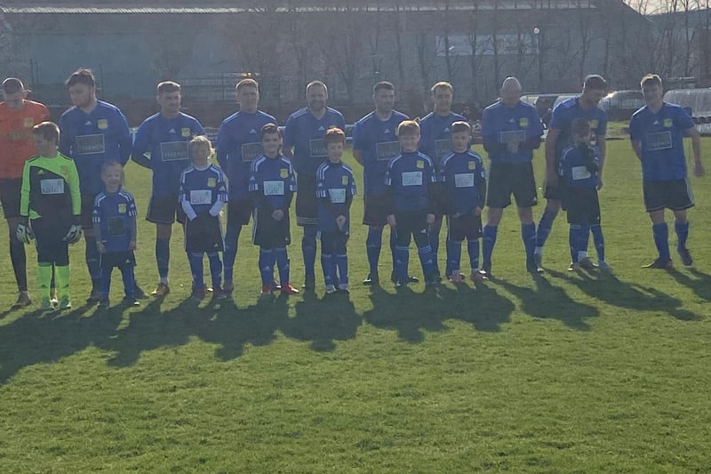 SJR Worksop line up ahead of kick off against Thorne with the mascots.