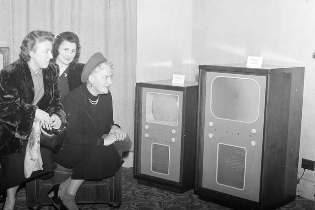 Singer Gracie Fields visits the television lounge in Jenners Department Store with friends Mary Davey and Greta Beattie in November 1952.