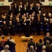 Mansfield Choral Society members are pictured in recent concert action. (Photo by Bruce Hammond)