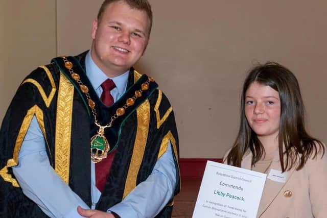 Libby Peacock received a Bassetlaw Achievers Awards from coun Jack Bowker for her fundraising efforts for her nanan.