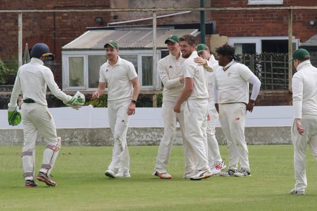 Harry Taylor is congratulated after taking a spectacular catch.