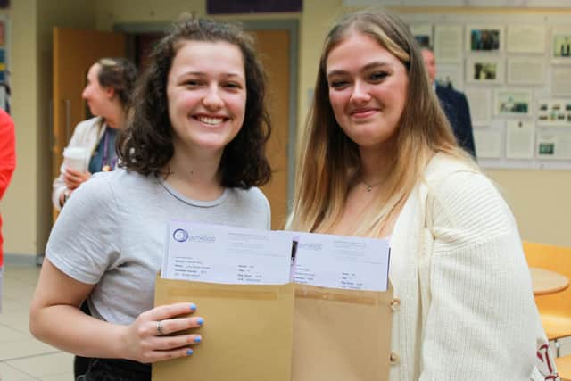 Friends Lucy Womble and Bronwyn Case standing proud with their results.