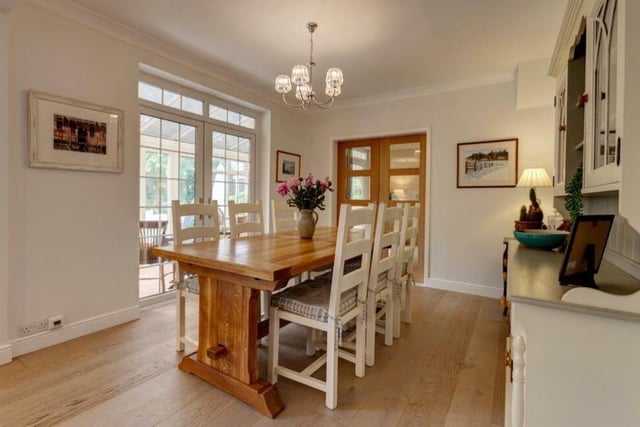This delightful dining area is easily accessible from the lounge. Featuring an engineered oak floor with underfloor heating, a coved ceiling and a pendant light point, it also connects to both the conservatory and breakfast kitchen.