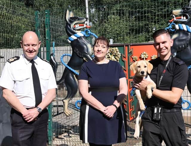 Chief Constable Craig Guildford, Nottinghamshire Police and Crime Commissioner Caroline Henry, handler PC James Sills and Buddy