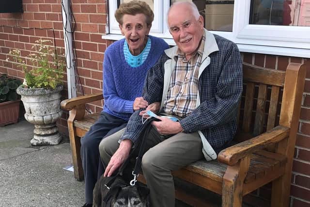 Ann and Roy Howe with rescue dog Bullet