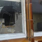 Part of an original wndow at The Vine Inn, Worksop, that was smashed deliberately.