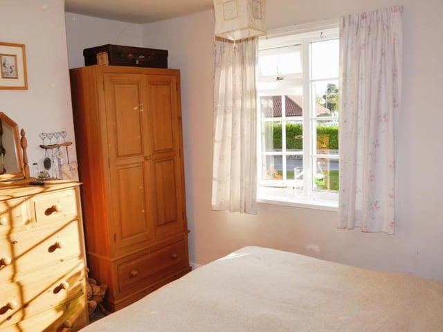 There is plenty of room for a wardrobe, drawers and storage in the main bedroom. It also houses an airing cupboard with a lagged hot-water tank, immersion heater and shelving for linen.