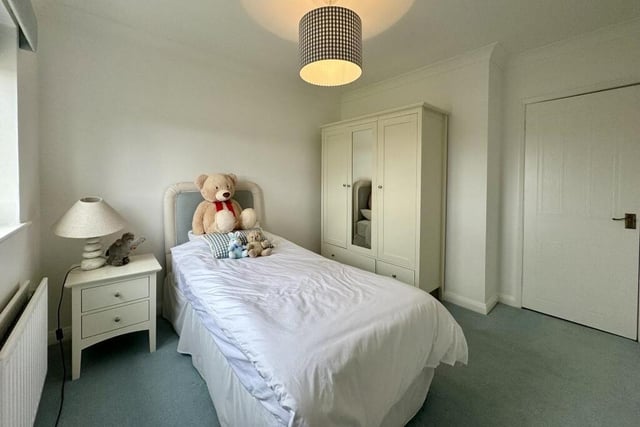 The last of the four double bedrooms, which faces the front of the house, gets the seal of approval from this teddy bear!