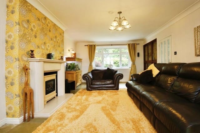 A coal-effect fire with surround gives the lounge a warm and homely feel. The floor is fully tiled.