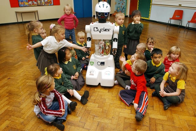 Another view of the recycling robot at St Joseph's School in 2004. Can you spot someone you know in this photo?