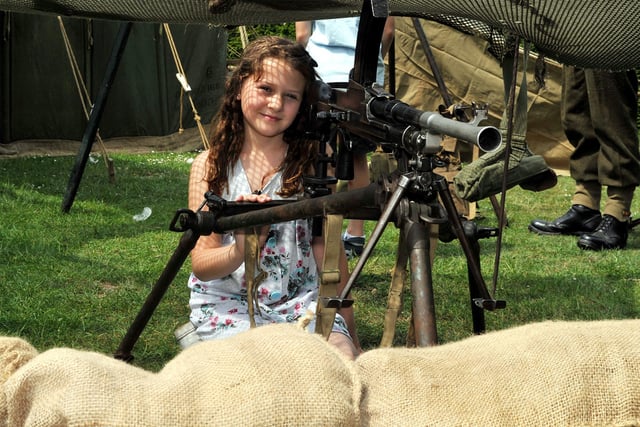 Chloe Wisbey, 10, checks out the attractions at a 1940s wartime festival at Clumber Park in 2010.