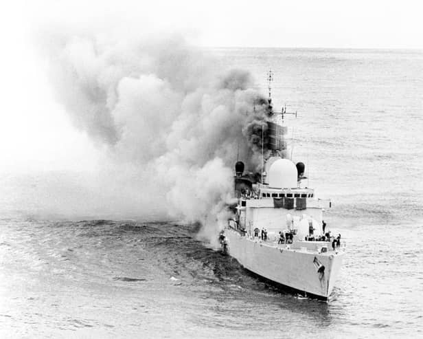A Ministry of Defenc picture of the stricken Destroyer HMS Sheffield, smoke pouring out of her after she had been hit by an exocet missile, during the Falklands conflict. She later sank with the loss of 20 lives.