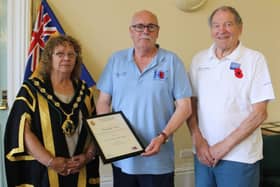Grant Cullen, Worksop RBL branch secretary and poppy appeal organiser pictured with Madelaine Richardson and David Scott.