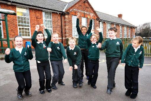 Children of Ryton Park Primary School celebrate the Worksop school's good Ofsted result in 2011.