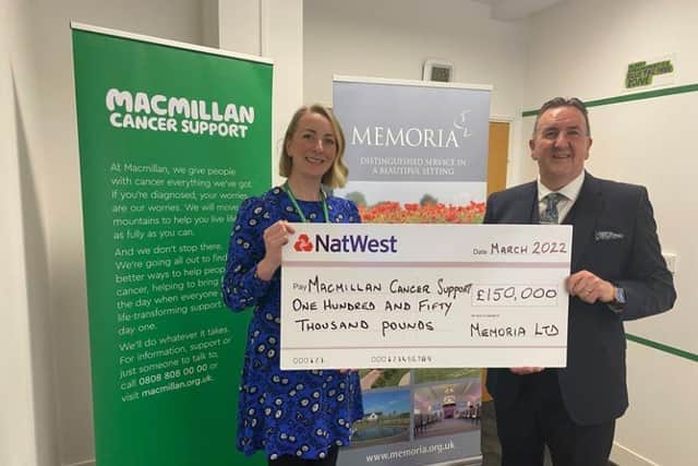 Kate Lightfoot, corporate partnerships manager at Macmillan Cancer Support, received the latest donation from Frank Meilack, director of community engagement at Memoria Ltd.
