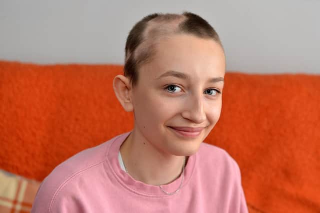 Ella Goodwin 13 has lost her hair due to illness. She doesn't want to wear a wig but is being told by the school she cannot wear a cap as it is against uniform policy.
