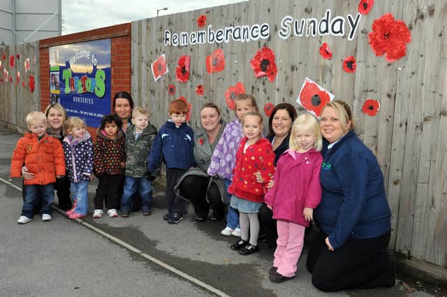 Children at Treetops Nursery have been making poppies for Remembrance Sunday. (w101110-3a)