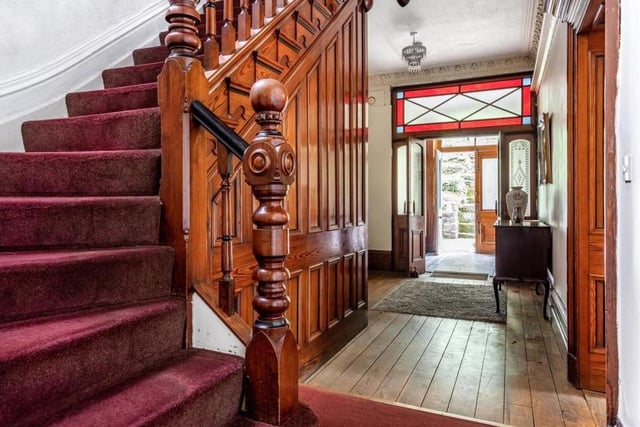 The front door of the property leads into a grand reception hall, where you are greeted by period features, including high ceilings and oak floors. Just off the hallway are a storage room and a WC.