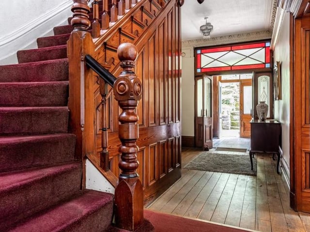 The front door of the property leads into a grand reception hall, where you are greeted by period features, including high ceilings and oak floors. Just off the hallway are a storage room and a WC.