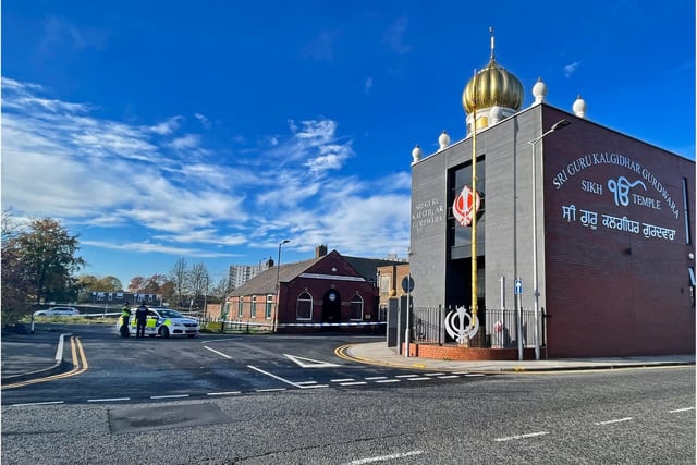 An area at the rear of the Sikh temple has been closed off by police.