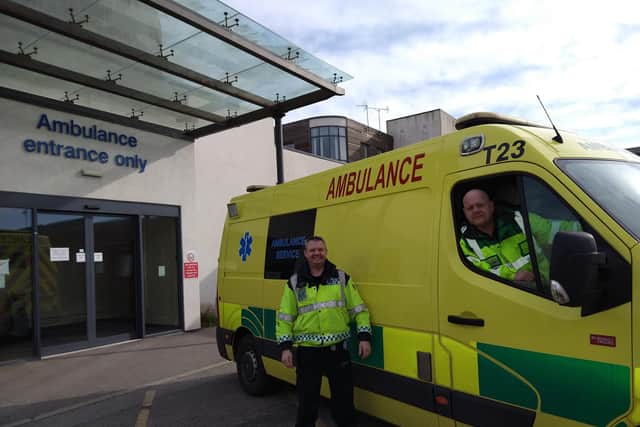Peter Harding, with driver and ambulance care assistant Darren Stocks-Mason.