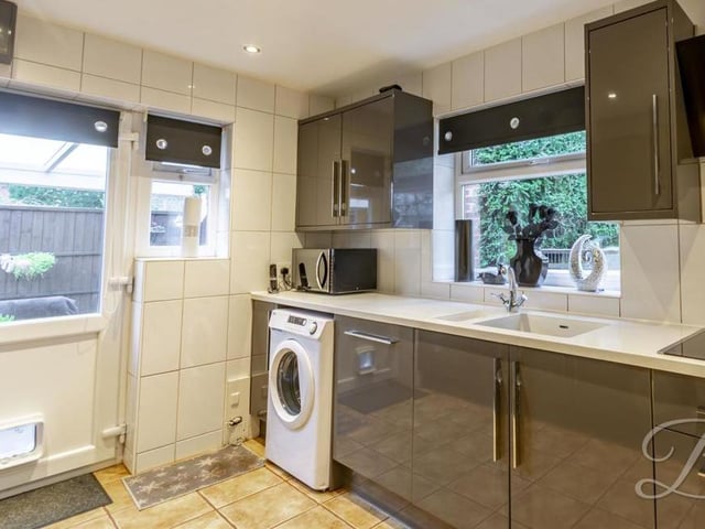 A final look at the sleek kitchen, which is obviously perfect for anyone who loves cooking. The downlights add a great ambience to the room too.
