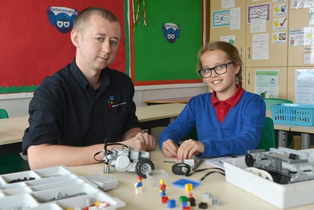 Chris Miller from Space to Learn working with Throston Grange Primary School pupil Kadie Sewell. Were you there for this robotics event?