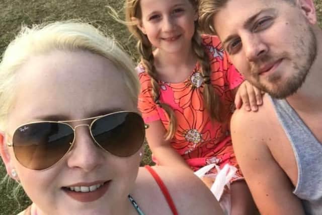 Adrian with wife Amy, 30, and daughter Skye, 11