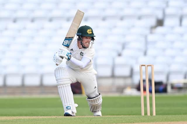 Tom Moores hit a century in the first innings. (Photo by Laurence Griffiths/Getty Images)