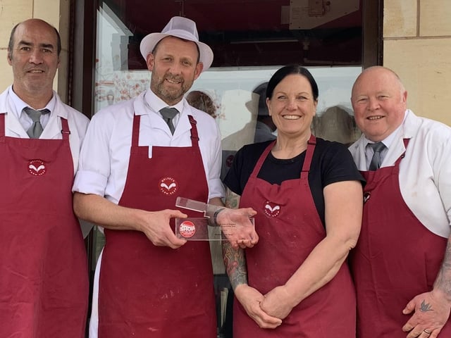 Farm shop colleagues with a Butchers' Shop of the Year Award.