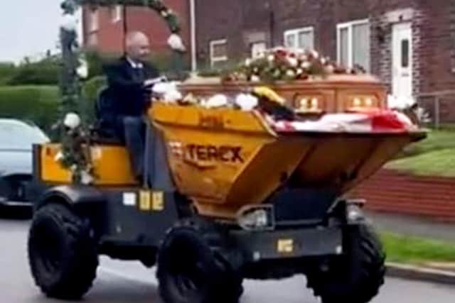Dave Newton's funeral with his coffin in a dumper truck.