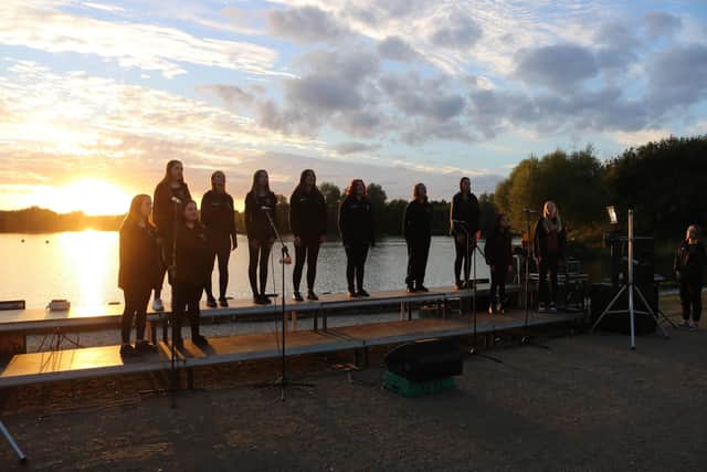 Hundreds ‘Light up the Lake’ at Bluebell Wood event for third year running. Pictured students from The Voice Academy Choir