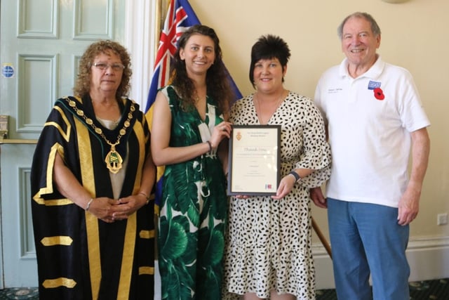 Olivia and Vicky Dashper pictured with councillor Madelaine Richardson, Bassetlaw Council chairman, and David Scott, chair of Worksop RBL branch.