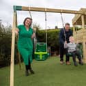St Augustine's teachers Amie Hoult and Tracey Howard and pupil Corey Colclough, aged three, Corey’s dad and Bellway senior site manager Andrew Colclough by the new play area.